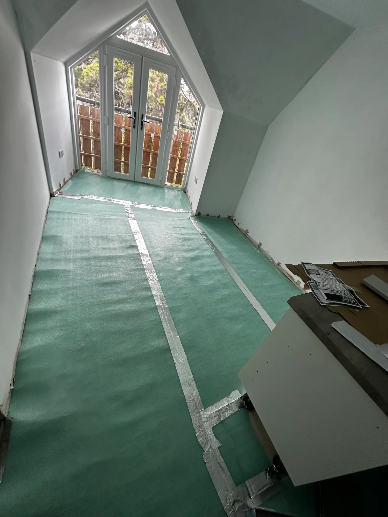 Laminate flooring underlayment installation in Oxfordshire