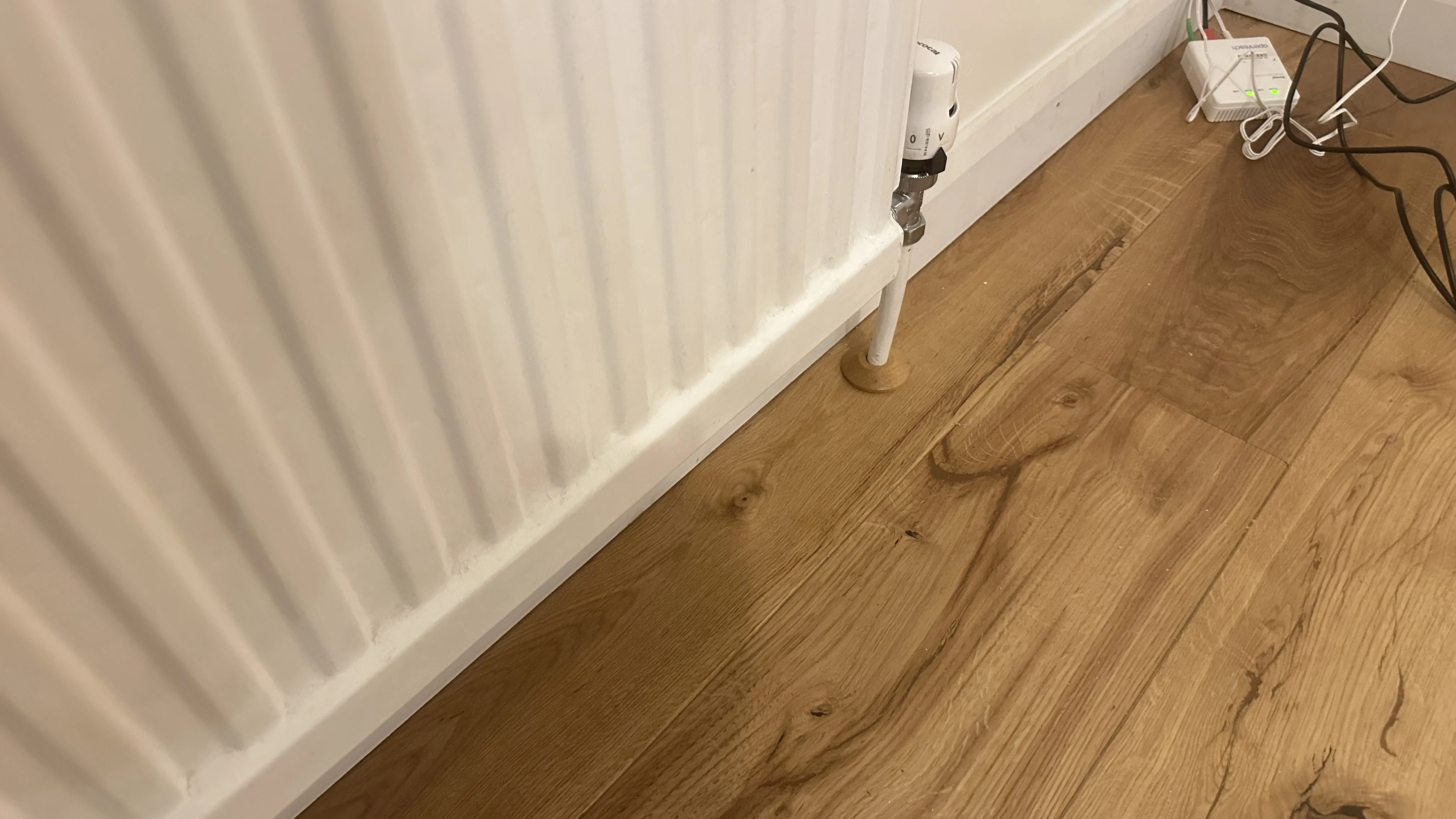 Flooring Installation project in Oxford - a white wall with a white light on it