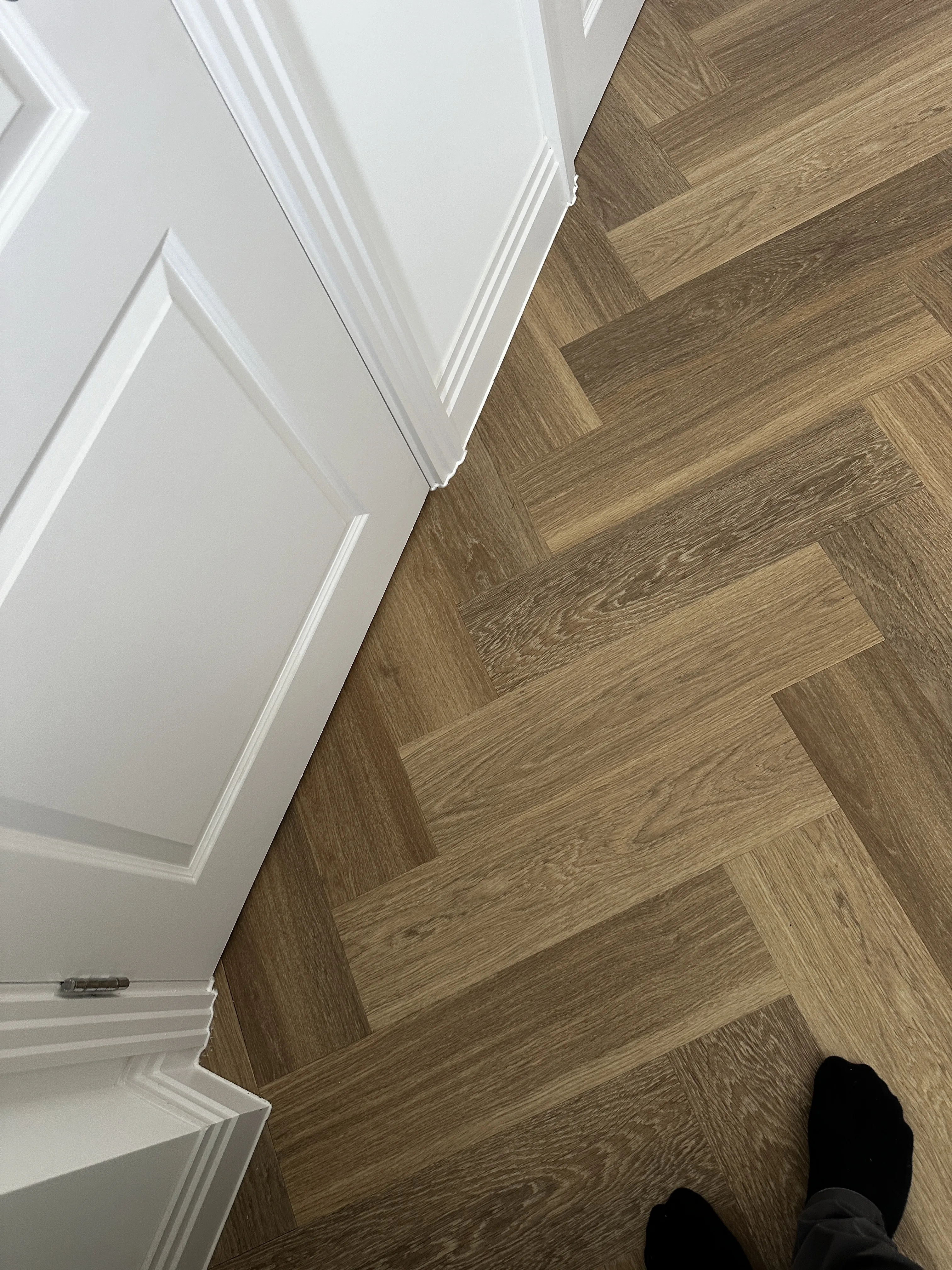 Flooring Installation project in Didcot - person standing on the floor in a room